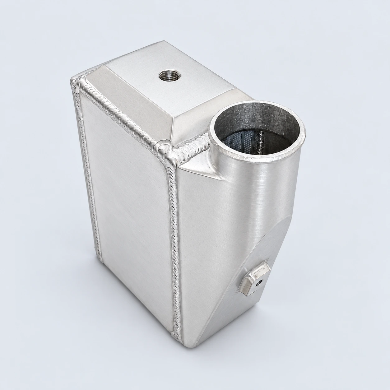 Angled view · Welded housing and mounting boss