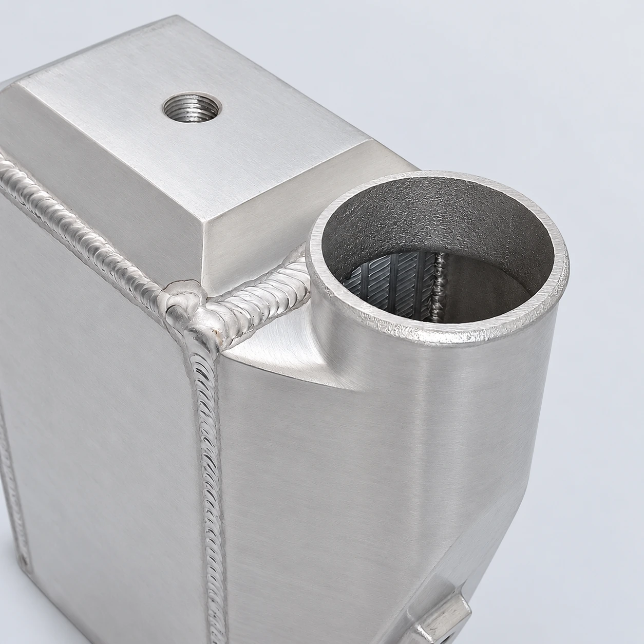 AWIC003-A close-up · Air connection, internal fins and weld detail
