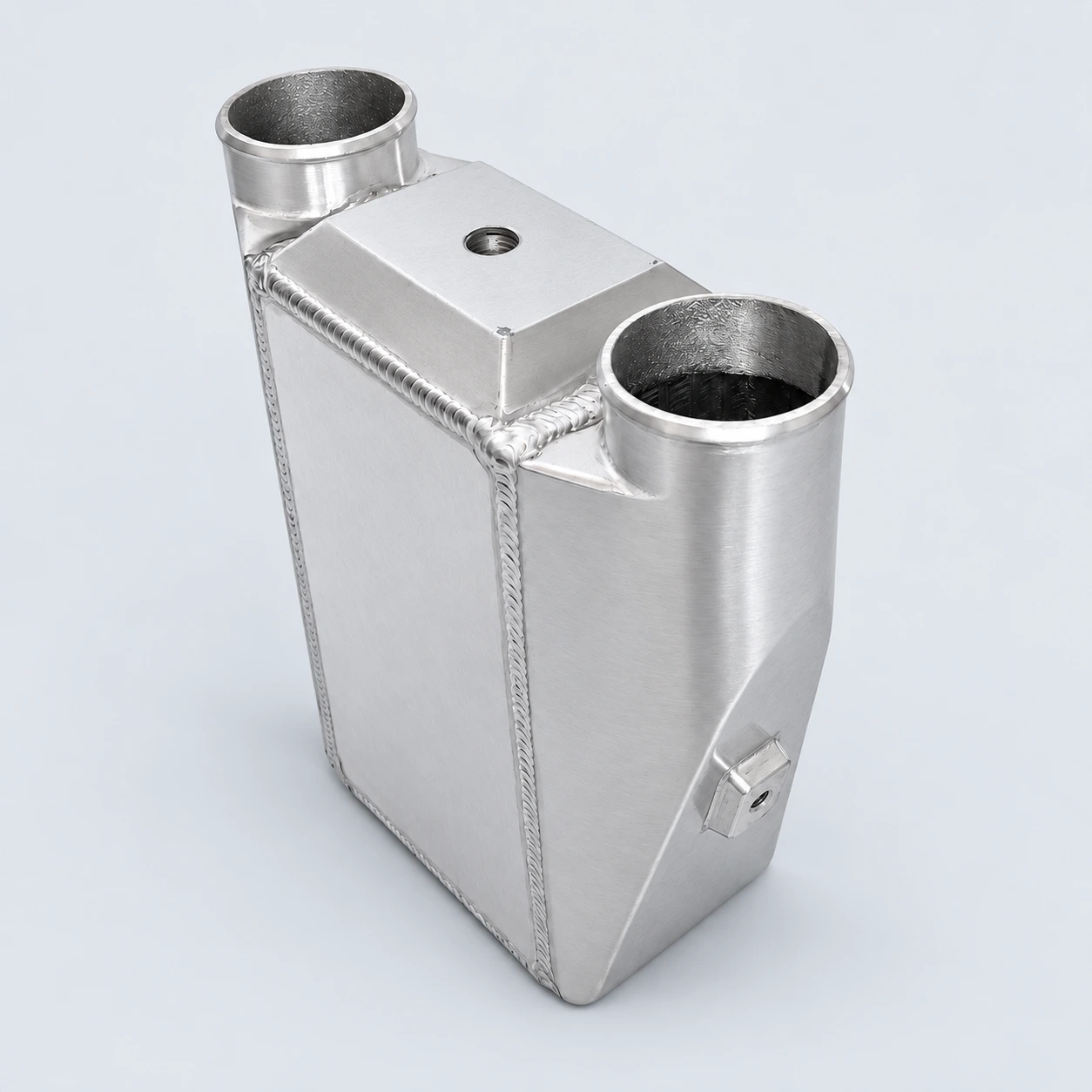 Angled view · Welded housing and mounting boss