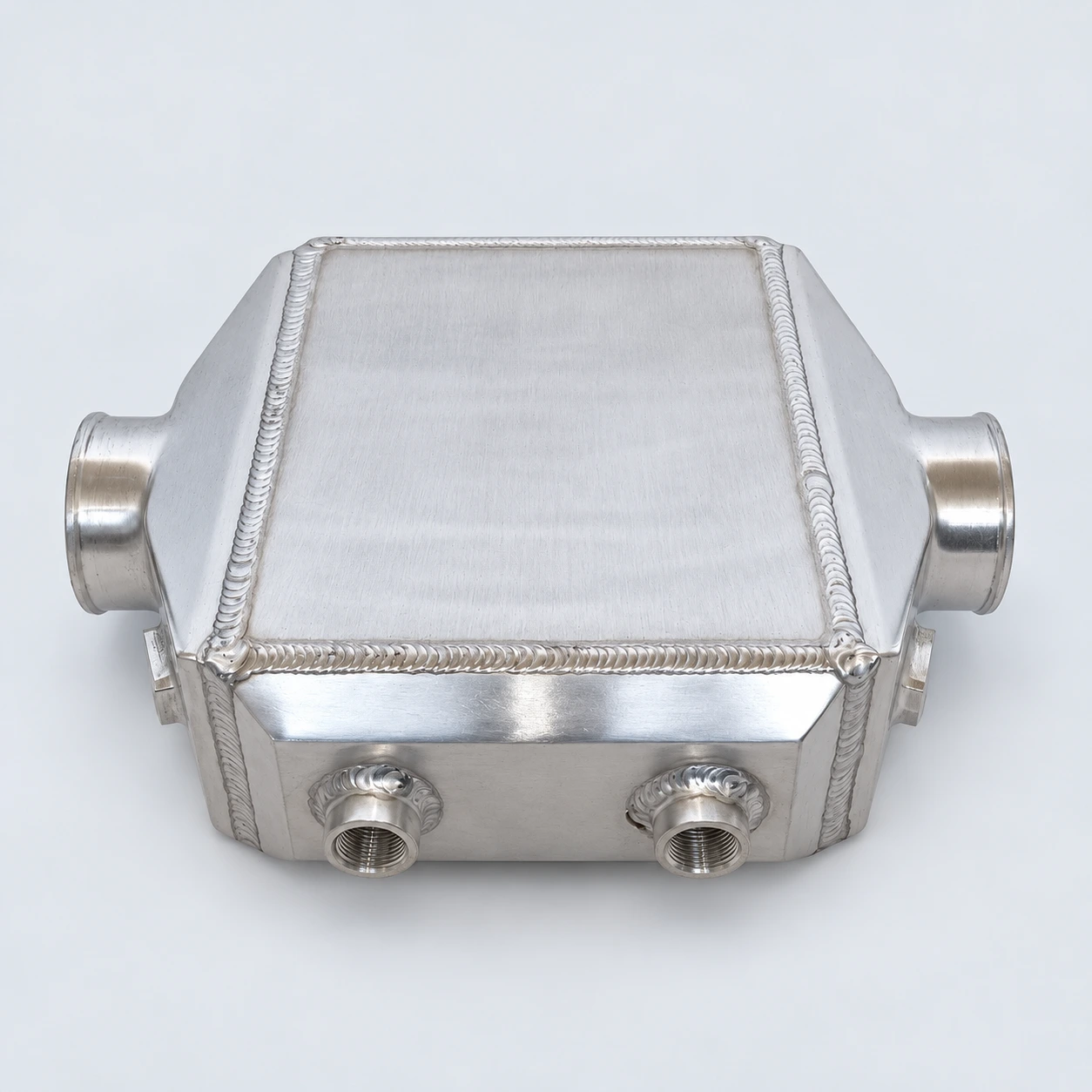 AWIC006-C close-up · Threaded coolant connections and welds